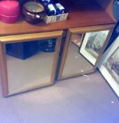 A pair of gilt framed mirrors