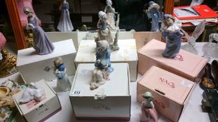 A quantity of boxed NAO figurines