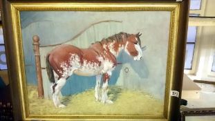 An oil on canvas horse in stable