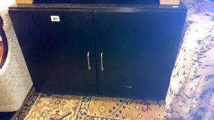 A black 2 door cupboard