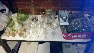 A shelf of glassware