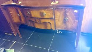 A mahogany veneered sideboard