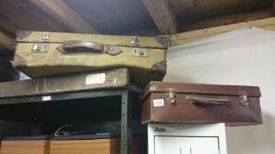 2 old suitcases