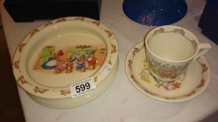 A Bunnikins tea cup, saucer and cereal bowl