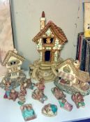 A quantity of Pendelfin houses and figures