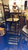 An oak refectory table and 8 chairs