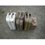 A quantity of old fuel cans