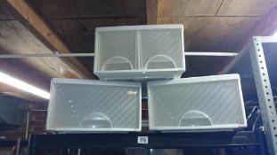 3 plastic storage boxes