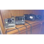 3 old Polaroid camera's