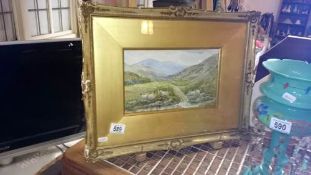 A framed and glazed watercolour country scene with sheep