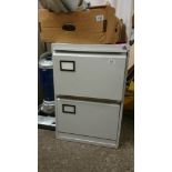 A 2 drawer metal filing cabinet with keys