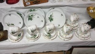 An 18 piece china tea set and one other