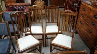 A set of 4 oak chairs