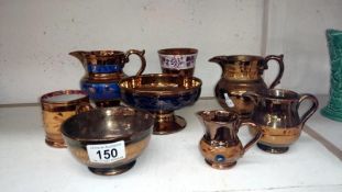 8 19th century lustre ware jugs