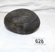 A carved egg shaped 'coconut shell' trinket box
