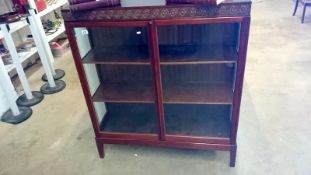 A mahogany book case