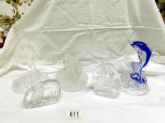 A glass elephant, glass seahorse,