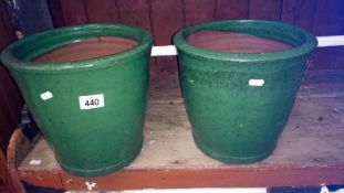 A pair of terracotta garden pots