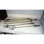 3 brass toasting forks and brass coal tongs