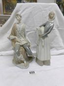 A pair of Lladro figurines,