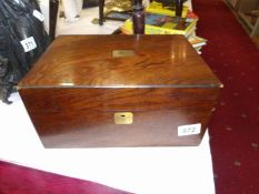 A walnut jewellery box with playing cards