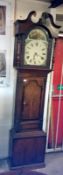 An oak long cased clock