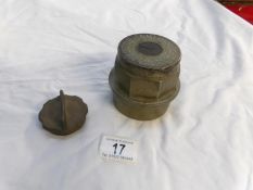 A large brass radiator cap and one other