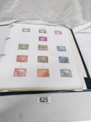 4 albums of 19th and 20th century British Empire stamps including Heligoland, Africa,