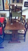 A dining table and 4 chairs