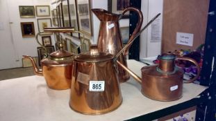 A copper jug, lidded saucepan,