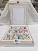 A cased set of 12 original glass Christmas decorations 'The Bridal collection' with certificate of