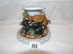 A Victorian ceramic ham stand surmounted wild boar and hounds