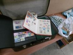 A suitcase of assorted stamps including albums, loose, GB, Victorian, colonies,