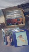 A box of progressive rock LP records including Quinressence, Door's, Pink Floyd,