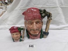 A large Royal Doulton character jug 'Lumberjack' D6610 and a smaller example D6813