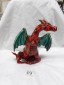 A hand made and hand painted dragon by Anita Harris