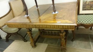 A 19th century dining table with stretcher and gallery base