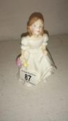 A Royal Doulton figurine,