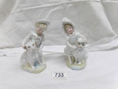 A pair of 19th century porcelain figures