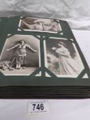 An album of in excess of 100 mainly Edwardian postcards including actresses such as Marie Studholme,