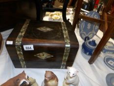 A rosewood writing box with mother of pearl inlay