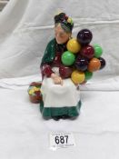 A Royal Doulton figurine, The Old balloon seller,