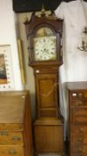 An oak long case clock by J Usher Lincoln
 
The right finial is present but not attached/fitted