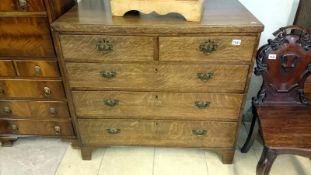 An oak 2 over 3 chest of drawers