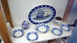 A Delft lidded jar, a blue and white ginger jar, meat platter,