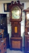 An 8 day long case clock by Wm Harrison,