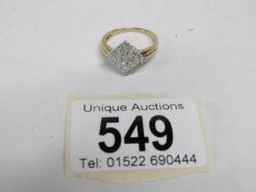 A diamond shaped white gold and diamond ring,