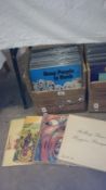 A box of progressive rock LP records including King Crimson, Nektar, Cream,