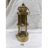 A rare 19th century brass miner's lamp marked Davis Derby