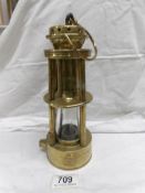 A rare 19th century brass miner's lamp marked Davis Derby